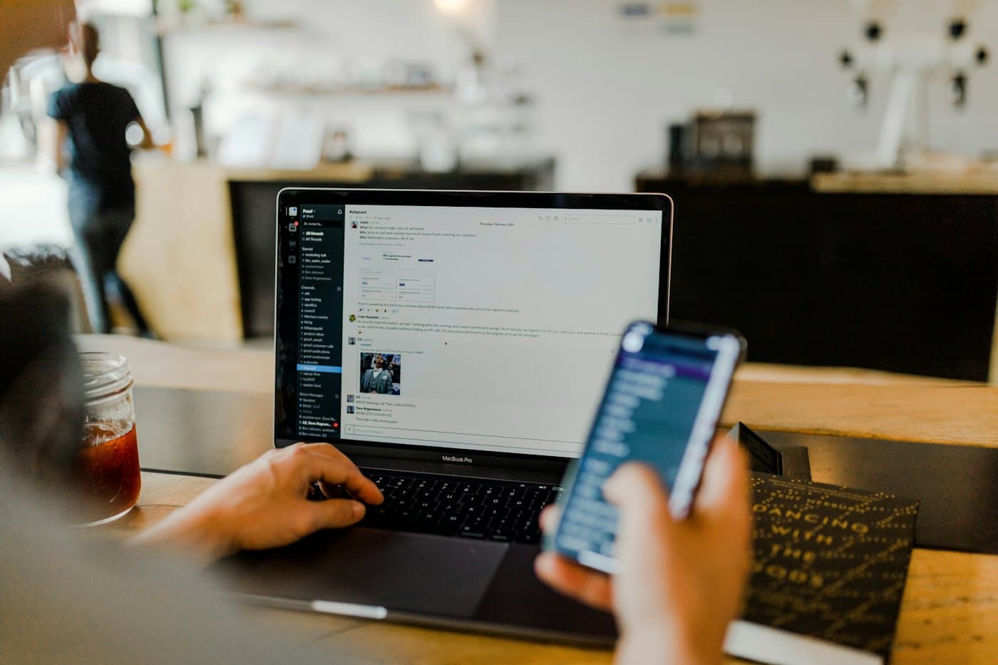Marketer reviewing a social and ads campaign on a laptop
